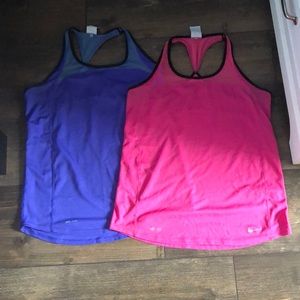Two matching Nike tank tops